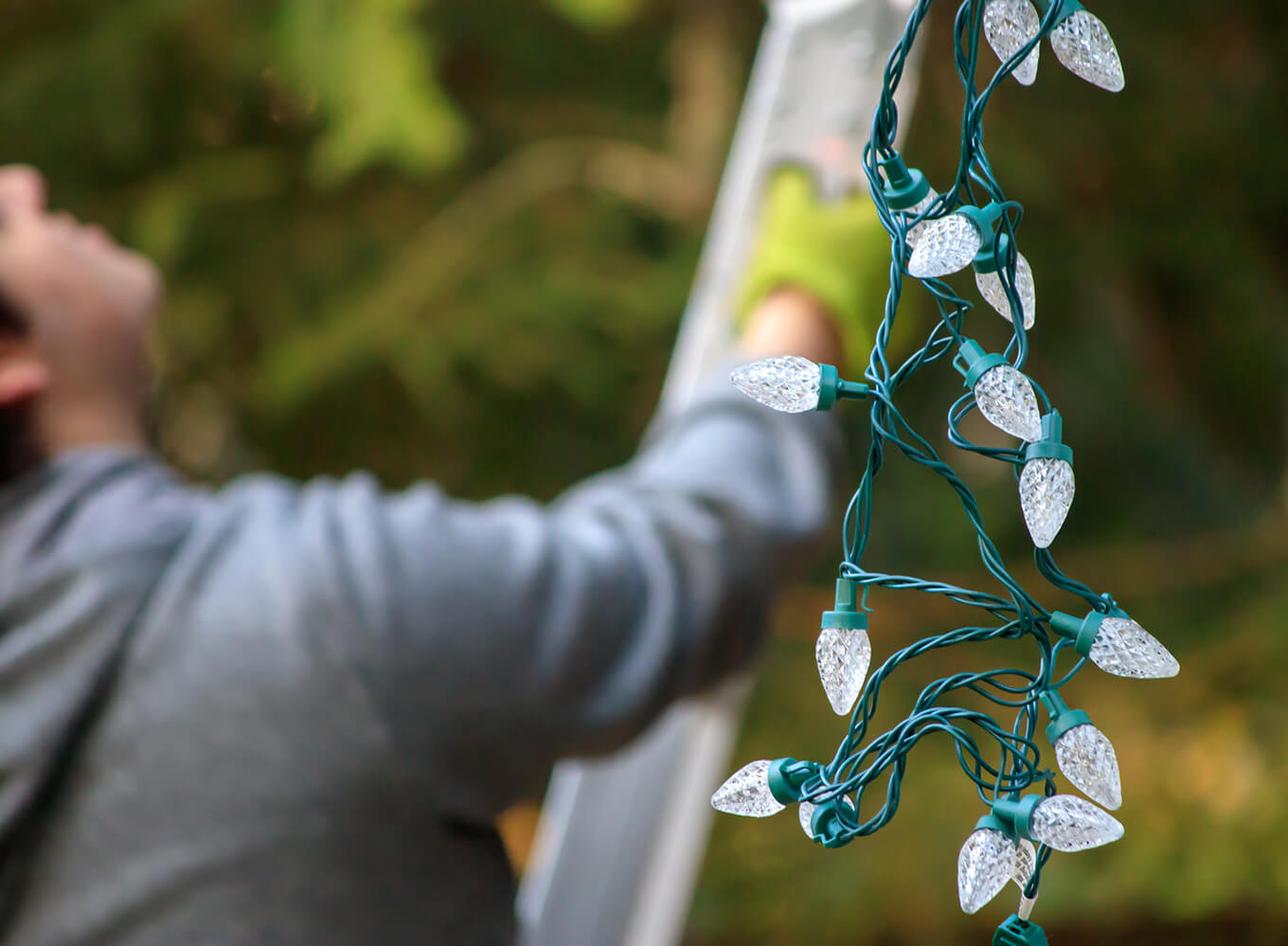 christmas lights intaller during christmas lights installation on a residential home